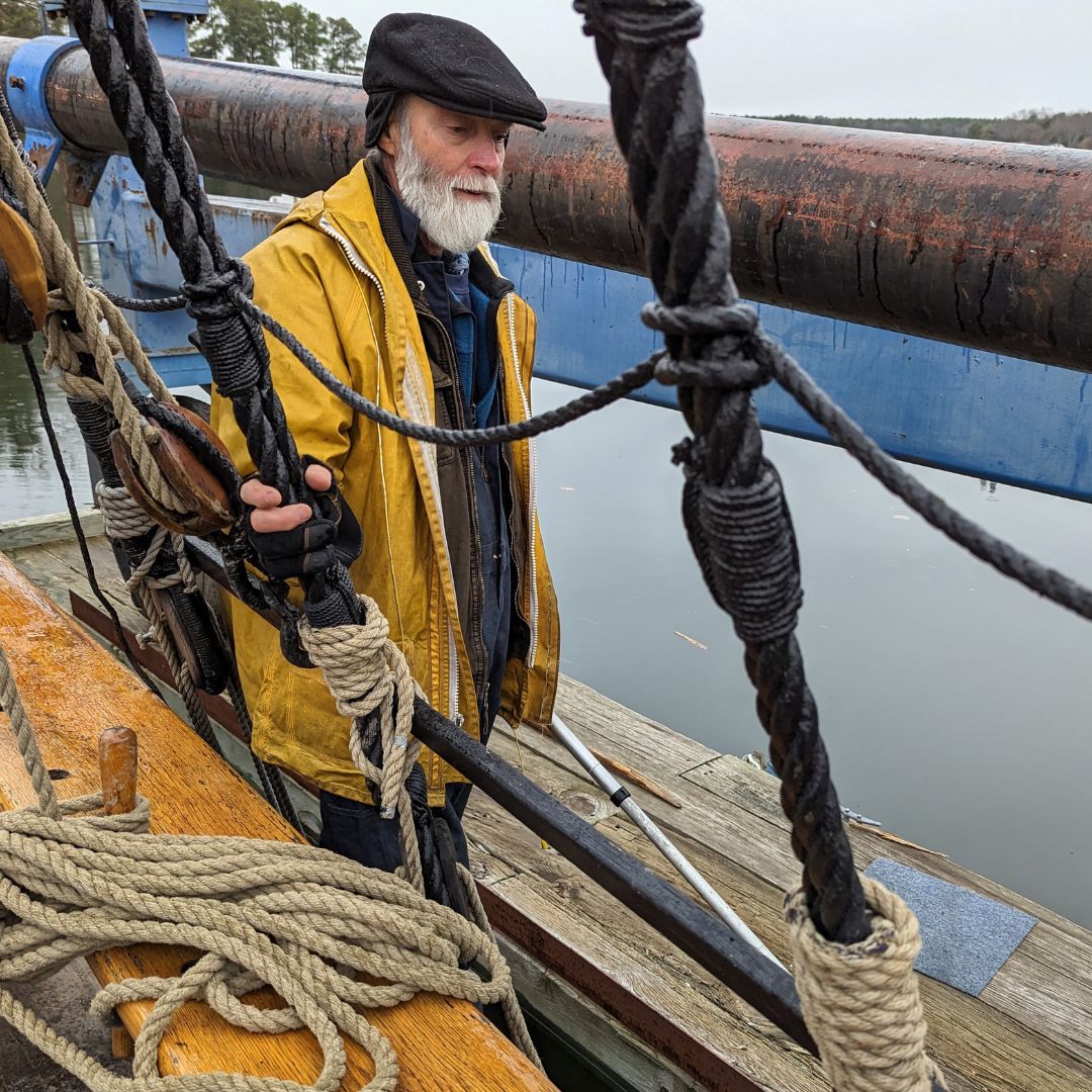 Captain Will Gates is standing on the deck of the 1978 Dove