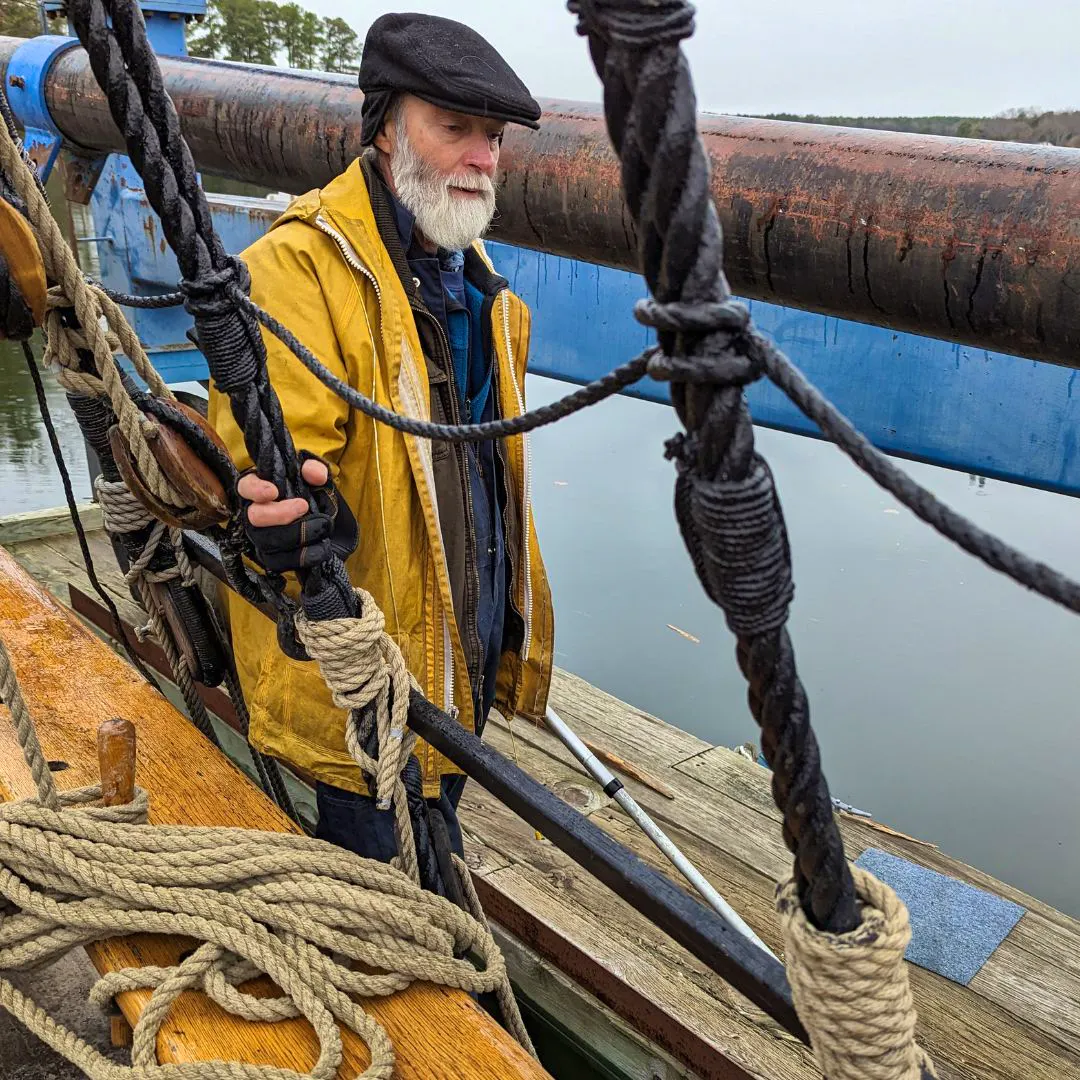 Captain Will Gates is standing on the deck of the 1978 Dove